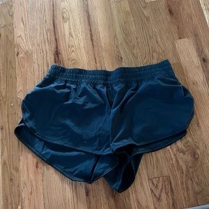 Dark green lululemon shorts size 8